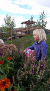 Kid With Flowers